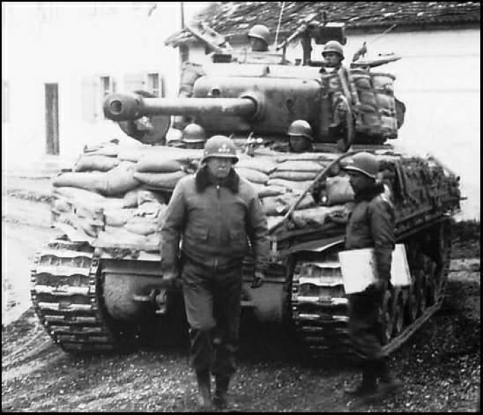 Gen. Patton in front of a U.S. Sherman tank. (YouTube) Gen. Patton in front of a U.S. Sherman tank. (YouTube)