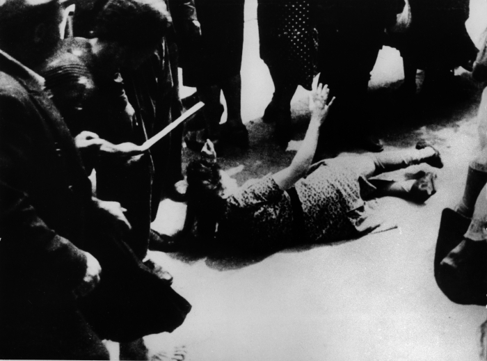 The lynching of four Jewish women at the hands of many Nazi sympathizers among the population of the city of Lviv, Ukraine: as soon as the Soviet troops left the city, excited by the supervened SS, they sparked a succession of pogroms. About 6000 Jews were killed in the city in one month, 2000 of them on 25 July. In the image, one of the victims. Still frame from a spontaneous movie, Ukraine, Lviv, July 1941. (Photo by Fototeca Gilardi/Getty Images)