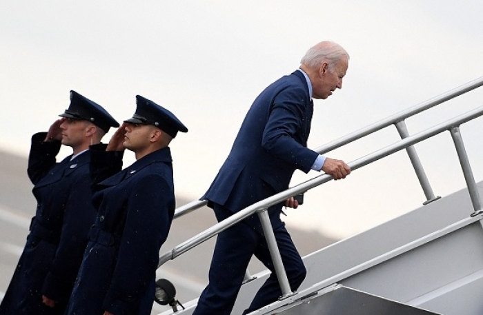 President Joe Biden boards Air Force One on May 6, 2022. (Photo by OLIVIER DOULIERY/AFP via Getty Images)