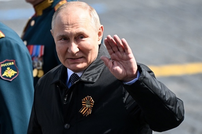 Russian President Vladimir Putin attends the Victory Day military parade in central Moscow on May 9, 2022. (Photo by KIRILL KUDRYAVTSEV/AFP via Getty Images)