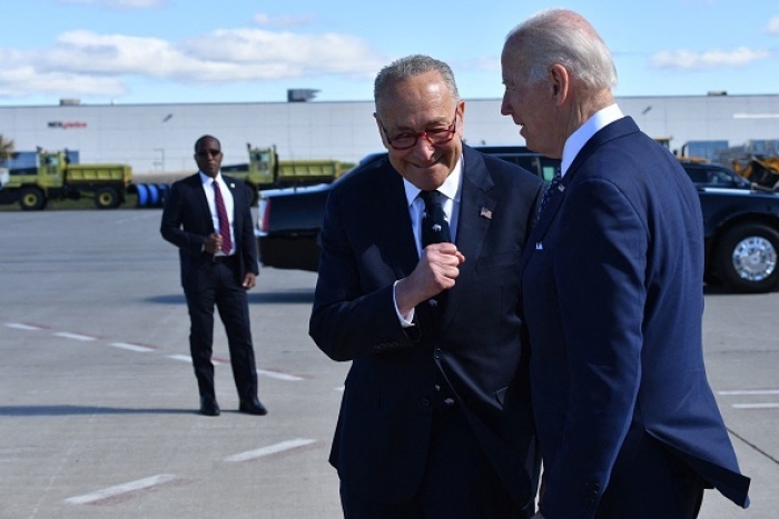 Senate Majority Leader Chuck Schumer (D-N.Y.) joined President Joe Biden in Buffalo to mourn victims of a mass shooting on May 17, 2022. (Photo by NICHOLAS KAMM/AFP via Getty Images)