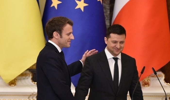 French President Emmanuel Macron with Ukrainian President Volodymyr Zelenskyy in Kyiv last February, days before the Russian invasion began. (Photo by Sergei Supinsky/AFP via Getty Images)