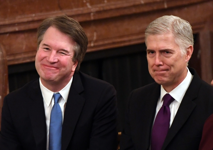 Supreme court Associate Justices Brett Kavanaugh, left, and Neil Gorsuch. (Getty Images)