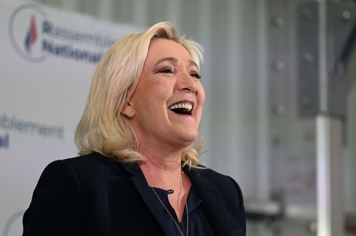 Marine le Pen celebrates her National Rally’s strong showing in Sunday’s legislative election. The far-right party increased in parliamentary representation more than tenfold. (Photo by Denis Charlet / AFP via Getty Images)