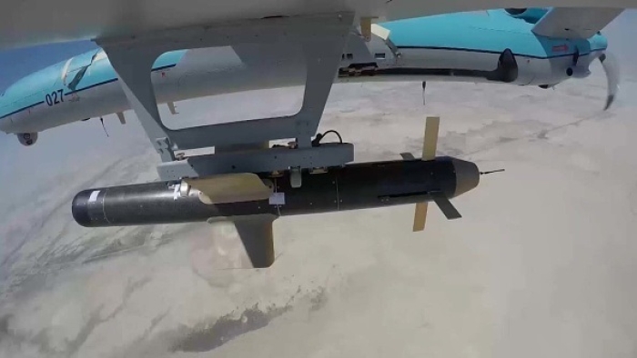 An Iranian Army photo posted in 2020 shows a missile carried by a Shahed Simorgh drone. (Photo by Iranian Army office/AFP via Getty Images)