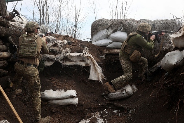 Ukrainian soldiers on the front line with Russian forces in the Luhansk region of the eastern Ukraine Donbass in April. Moscow claimed this week to have taken control of the region. (Photo by Anatolii Stepanov/AFP via Getty Images)