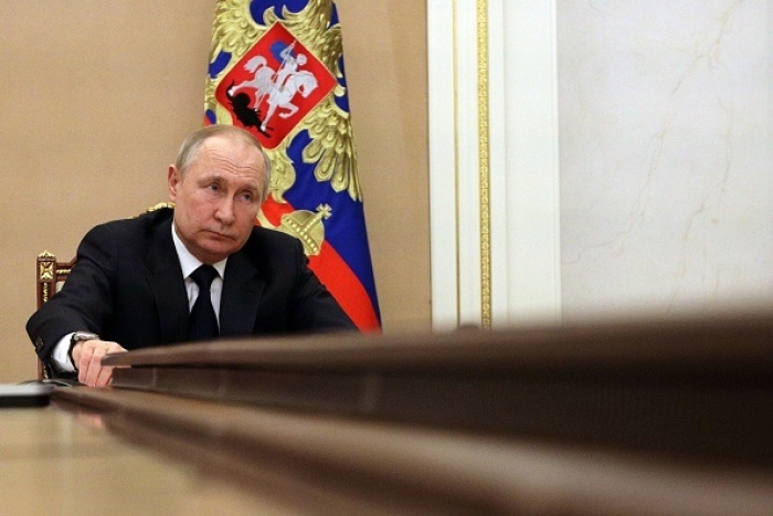 Putin chairs a teleconference meeting with members of the government in March. (Photo by Mikhail Klimentyev/ Sputnik /AFP via Getty Images)