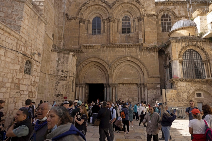Christian pilgrims visit the Church of the Holy Sepulchre in Jerusalem's Old City during Holy Week, on April 19, 2022. (Getty images)