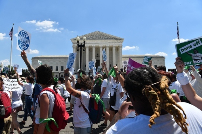 Abortion rights activists rally outside the US Supreme Court after the overturning of Roe Vs. Wade on June 30, 2022. (Photo by NICHOLAS KAMM/AFP via Getty Images)