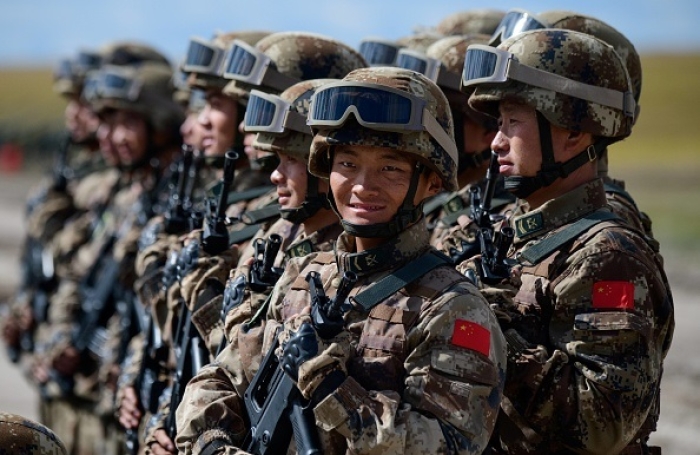 Chinese troops parade at the Vostok-2018 (East-2018) military drills near the borders with China and Mongolia in Siberia, on September 13, 2018. (Photo credit should read MLADEN ANTONOV/AFP via Getty Images)