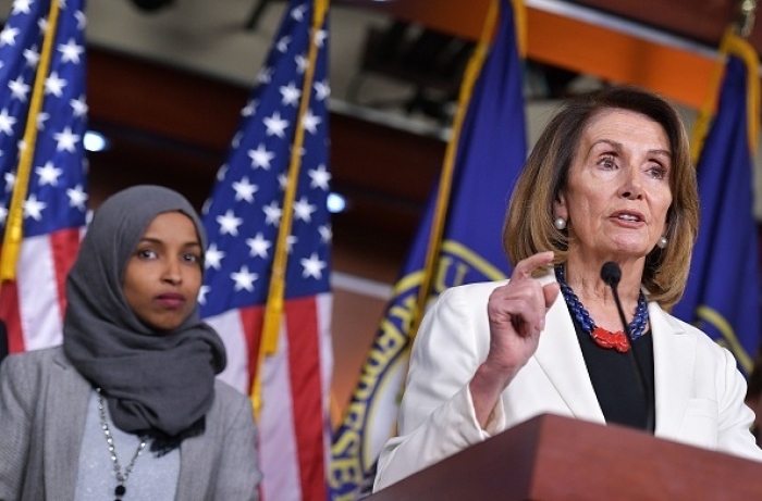 Ilhan Omar, one of the first two Muslim women to be elected to Congress, with Democratic Leader Nancy Pelosi after the 2018 midterm election. (Photo by Mandel Ngan / AFP via Getty Images) Ilhan Omar, one of the first two Muslim women to be elected to Congress, with Democratic Leader Nancy Pelosi after the 2018 midterm election. (Photo by Mandel Ngan / AFP via Getty Images)