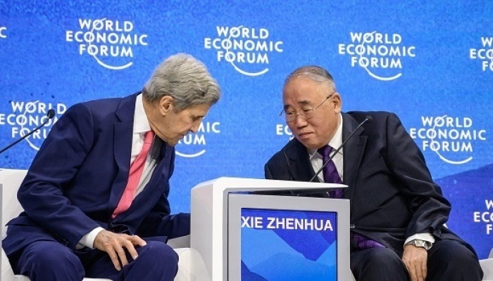 US climate envoy John Kerry and China’s special climate envoy Xie Zhenhua at the World Economic Forum annual meeting in Davos last May. (Photo by Fabrice Coffrini / AFP via Getty Images) US climate envoy John Kerry and China’s special climate envoy Xie Zhenhua at the World Economic Forum annual meeting in Davos last May. (Photo by Fabrice Coffrini / AFP via Getty Images)