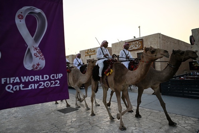 Camel-mounted royal guards patrol in Doha, Qatar, host of the 2022 soccer World Cup. (Photo by Kirill Kudryavtsev / AFP via Getty Images) Camel-mounted royal guards patrol in Doha, Qatar, host of the 2022 soccer World Cup. (Photo by Kirill Kudryavtsev / AFP via Getty Images)