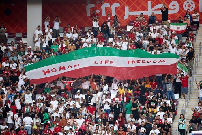 Iranian soccer fans hold up a banner in support of the protests in their homeland, during last week's World Cup game between Iran and England in Doha. (Photo by Juan Luis Diaz/Quality Sport Images/Getty Images) Iranian soccer fans hold up a banner in support of the protests in their homeland, during last week's World Cup game between Iran and England in Doha. (Photo by Juan Luis Diaz/Quality Sport Images/Getty Images)