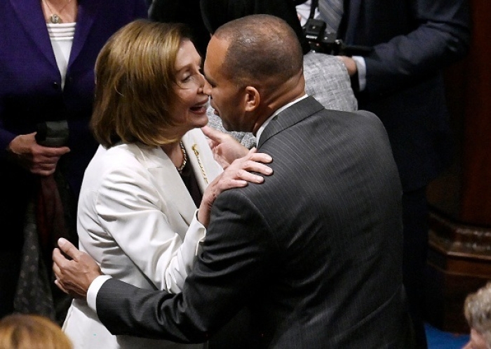 Outgoing Speaker of the House of Representatives Nancy Pelosi greets Representative Hakeem Jeffries, her apparent successor, on November 17, 2022. (Photo by OLIVIER DOULIERY/AFP via Getty Images) Outgoing Speaker of the House of Representatives Nancy Pelosi greets Representative Hakeem Jeffries, her apparent successor, on November 17, 2022. (Photo by OLIVIER DOULIERY/AFP via Getty Images)