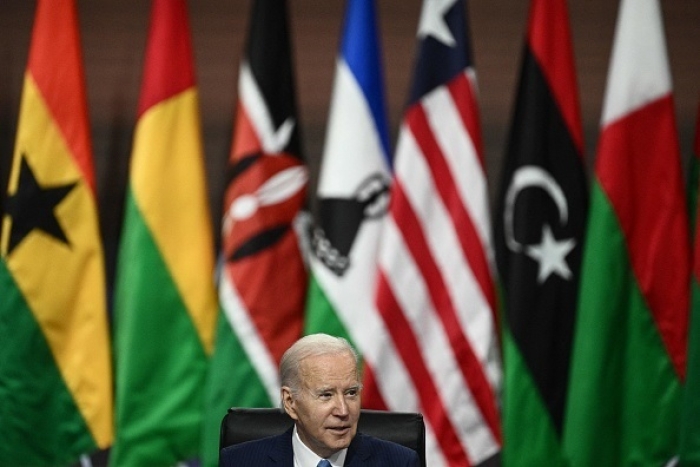 President Biden addresses the U.S.-Africa Summit in Washington on Thursday. (Photo by Brendan Smialowski / AFP via Getty Images) Biden Pledges $55B to African Nations; Most Are Not Free Democracies