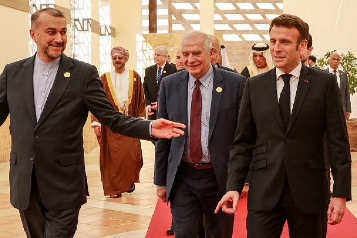 Iranian foreign minister Hossein Amirabdollahian walks with French President Emmanuel Macron and E.U. foreign policy chief Josep Borrell at the conference in Jordan. (Photo by Khalil Mazraawi / AFP via Getty Images) Iranian foreign minister Hossein Amirabdollahian walks with French President Emmanuel Macron and E.U. foreign policy chief Josep Borrell at the conference in Jordan. (Photo by Khalil Mazraawi / AFP via Getty Images)