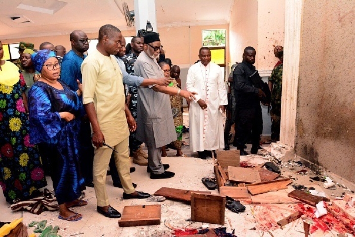 The governor of Nigeria’s Ondo state visits a Catholic Church attacked by gunmen last June. Dozens of worshippers were killed in the Pentecost Sunday atrocity. (Photo by -/AFP via Getty Images) The governor of Nigeria’s Ondo state visits a Catholic Church attacked by gunmen last June. Dozens of worshippers were killed in the Pentecost Sunday atrocity. (Photo by -/AFP via Getty Images)
