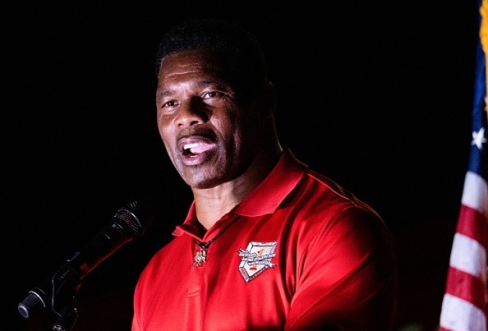 Republican Herschel Walker lost his runoff election to Senate incumbent Raphael Warnock, but he told his supporters, "we're all winners." (Photo by SETH HERALD/AFP via Getty Images) Republican Herschel Walker lost his runoff election to Senate incumbent Raphael Warnock, but he told his supporters, "we're all winners." (Photo by SETH HERALD/AFP via Getty Images)