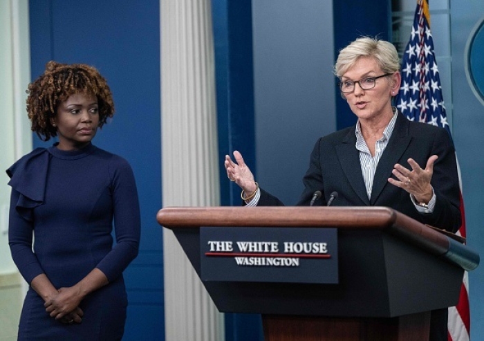 Energey Secretary Jennifer Granholm joins White House Press Secretary Karine Jean-Pierre at Monday's press briefing, Jan. 23, 2023. (Photo by ANDREW CABALLERO-REYNOLDS/AFP via Getty Images)