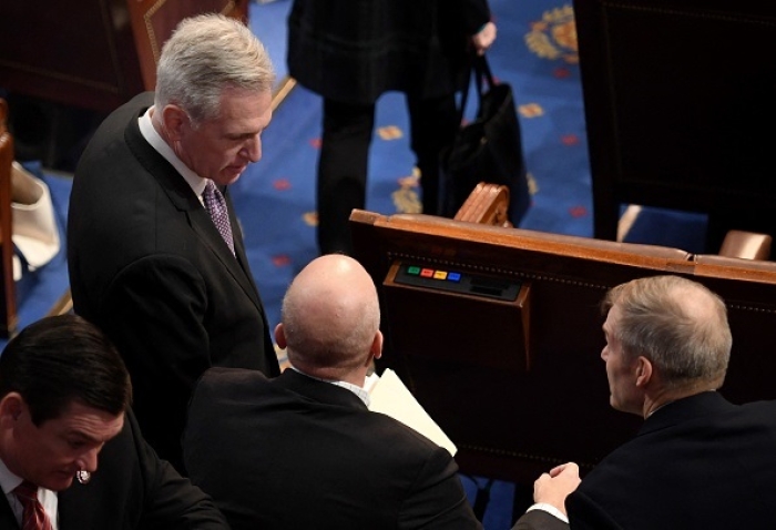 Rep. Kevin McCarthy speaks with Republican Reps. Chip Roy (bald) and Jim Jordan during the protracted battled for the House Speakership on January 4, 2023. (Photo by OLIVIER DOULIERY/AFP via Getty Images) Rep. Kevin McCarthy speaks with Republican Reps. Chip Roy (bald) and Jim Jordan during the protracted battled for the House Speakership on January 4, 2023. (Photo by OLIVIER DOULIERY/AFP via Getty Images)