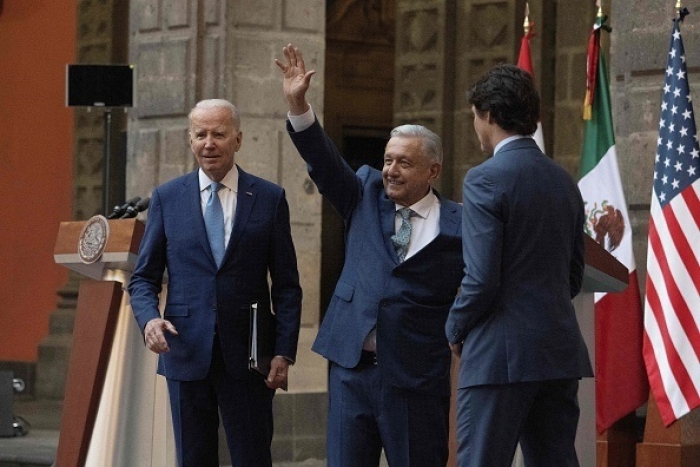 President Biden, Mexican President Andres Manuel López Obrador, and Canadian Prime Minister Justin Trudeau in Mexico City on Tuesday. (Photo by Jim Watson / AFP via Getty Images) President Biden, Mexican President Andres Manuel López Obrador, and Canadian Prime Minister Justin Trudeau in Mexico City on Tuesday. (Photo by Jim Watson / AFP via Getty Images)