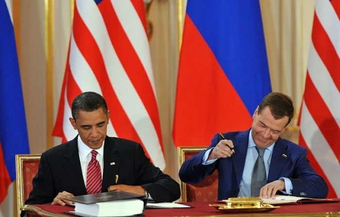 President Barack Obama and Russian President Dmitry Medvedev sign the new START Treaty in Prague in April 2010. (Photo by Yuri Kadobnov / AFP via Getty Images) President Barack Obama and Russian President Dmitry Medvedev sign the new START Treaty in Prague in April 2010. (Photo by Yuri Kadobnov / AFP via Getty Images)