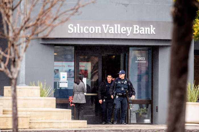 Police officers leave Silicon Valley Banks headquarters in Santa Clara, California on March 10, 2023. - US authorities swooped in and seized the assets of SVB, a key lender to US startups since the 1980s, after a run on deposits made it no longer tenable for the medium-sized bank to stay afloat on its own. (Getty Images) Police officers leave Silicon Valley Banks headquarters in Santa Clara, California on March 10, 2023. - US authorities swooped in and seized the assets of SVB, a key lender to US startups since the 1980s, after a run on deposits made it no longer tenable for the medium-sized bank to stay afloat on its own. (Getty Images)