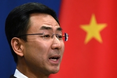 Chinese foreign ministry spokesman Geng Shuang briefs media. (Photo by Greg Baker/AFP via Getty Images)