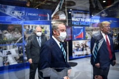 Ford Motor Company CEO Jim Hackett (L) and Executive Chairman of Ford William Clay Ford Jr. (C) tour with US President Donald Trump the Ford Rawsonville Plant in Ypsilanti, Michigan on May 21, 2020. (Photo by BRENDAN SMIALOWSKI/AFP via Getty Images)