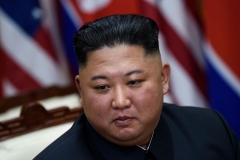 North Korea's leader Kim Jong Un is featured before a meeting with U.S. President Donald Trump. (Photo credit: BRENDAN SMIALOWSKI/AFP via Getty Images)