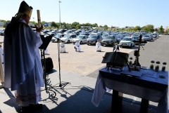 In Chalons-en-Champagne, Bishop Francois Touve leads an open-air Mass on May 17 for some 500 parishioners, sitting in their vehicles. (Photo by Francois Nascimbeni/AFP via Getty Images)