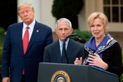 President Trump watches two of his task force medical experts at a news conference on March 29, 2020. (Photo by JIM WATSON/AFP via Getty Images)