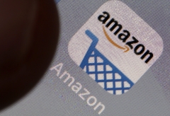 Amazon's app logo is featured on an iPhone screen. (Photo credit: Chesnot/Getty Images)