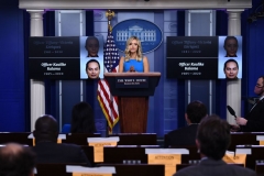 White House Press Secretary Kayleigh McEnany speaks to the press on June 3, 2020, while displaying images of Honolulu Police Officers, who died in the line of duty, during a daily press briefing in the Brady Briefing Room of the White House in Washington, DC. (Photo by BRENDAN SMIALOWSKI/AFP via Getty Images)