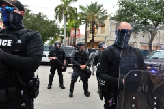Police in riot gear look on during a protest against police brutality and racism on June 07, 2020 in Hollywood, Florida. (Photo credit: Johnny Louis/Getty Images)