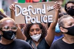 The call to "Defund the Police" is a popular slogan at Black Lives Matter rallies across the nation and at this one on June 19 in New York. (Photo by Ira L. Black/Corbis via Getty Images)