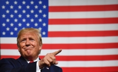 President Trump makes a point at one of his pre-pandemic campaign rallies. (Photo by NICHOLAS KAMM/AFP via Getty Images)