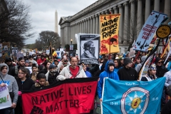 Activists gather protesting the Dakota Pipeline during the Native Nations Rise protest on March 10, 2017 in Washington, D.C. (Photo credit: BRENDAN SMIALOWSKI/AFP via Getty Images)