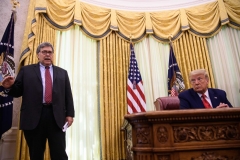 President Donald Trump listens to Attorney General Bill Barr(L) in the Oval Office at the White House after receiving a briefing from top law enforcement officials on operations against the MS-13 gang in Washington, DC, on July 15, 2020. (Photo by NICHOLAS KAMM/AFP via Getty Images)