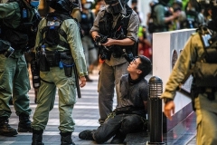 Hong Kong police arrest a protester during a rally against the new Beijing-imposed national security law on July 1, the 23rd anniversary of the city’s handover from Britain to China. (Photo by Anthony Wallace/AFP via Getty Images)