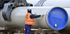 A worker on the Nord Stream 2 gas pipeline’s sector in northeastern Germany. (Photo by Tobias Schwarz/AFP via Getty Images)