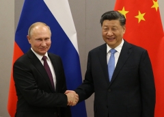 Russian President Vladimir Putin with Chinese President Xi Jinping in Nov. 2019. (Photo by Mikhail Svetlov/Getty Images)