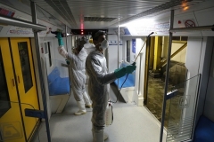 Municipal workers in Tehran disinfect a subway car in a bid to prevent the spread of COVID-19. (Photo by Atta Kenare/AFP via Getty Images)