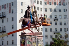 The statue of Confederate General J.E.B. Stuart is removed from Monument Avenue in Richmond, Virginia on July 7, 2020. (Photo by RYAN M. KELLY/AFP via Getty Images)