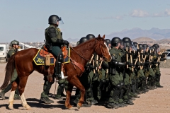 U.S. Border Patrol agents conduct a training exercise in the Anapra area, in front of the wall that divides Sunland Park, New Mexico, US, from Mexico, as seen from Ciudad Juarez, Chihuahua state, on Jan. 31, 2020.