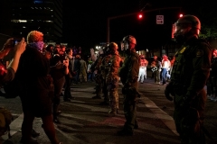 Police and protestors stand off in Portland, Oregon. (Photo by Alisha Jucevic/AFP via Getty Images)