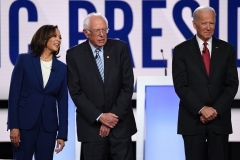 Sens. Kamala Harris, Bernie Sanders,and former Vice President Joe Biden at the fourth Democrat primary debate of the 2020 presidential campaign season in Westerville, Ohio on October 15, 2019. (Photo by SAUL LOEB/AFP via Getty Images)