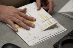 A county election worker prepares absentee ballots in Dayton, Ohio on March 17, 2020. (Photo by MEGAN JELINGER/AFP via Getty Images)