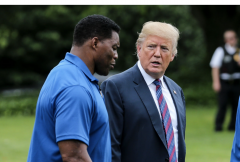 Herschel Walker and President Donald Trump at the White House, May 30, 2018. (Photo by Olvier Contreras-Pool/Getty Images)